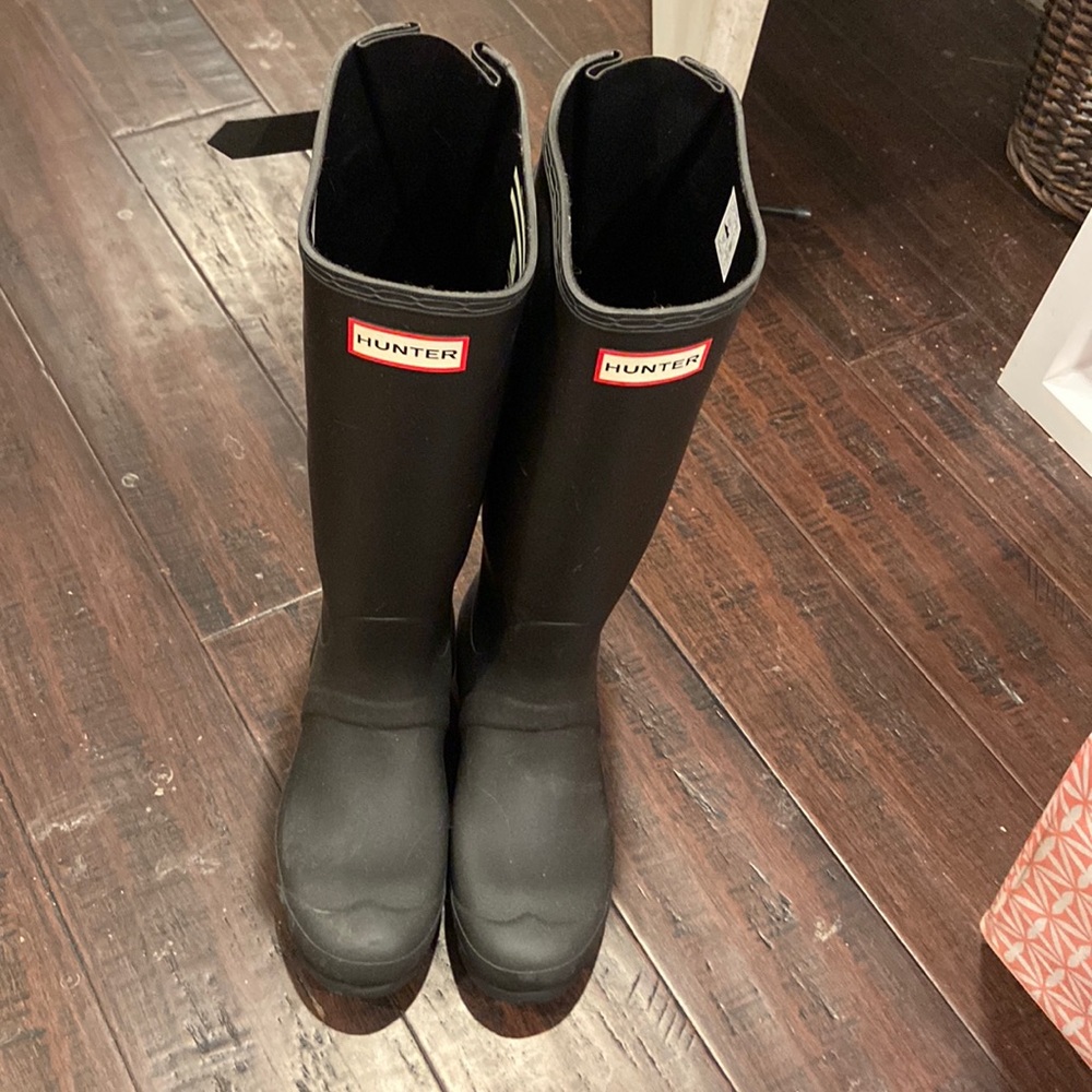Tall black hunter rain boots
